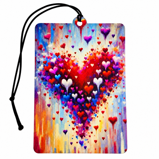 Colourful heart car air freshener featuring vibrant red, pink, purple, blue and white hearts in an abstract paint splash design with black hanging cord.