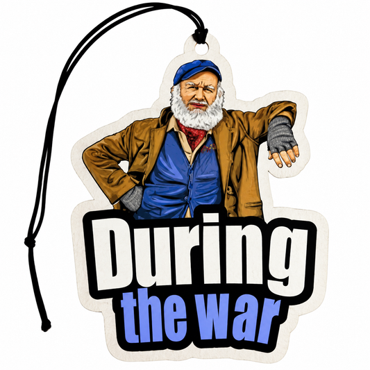 During The War car air freshener featuring an Uncle Albert-inspired elderly man with a white beard, blue cap, brown jacket and bold slogan with black hanging cord.