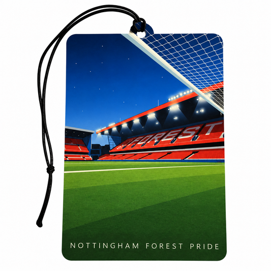A rectangular luggage tag ir Car Air Freshener featuring a printed graphic of a football stadium at night with green grass, red stands, and a black hanging cord. The text 'NOTTINGHAM FOREST PRIDE' appears along the bottom edge.