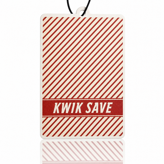 Red and white striped car air freshener with 'Kwik Save' text on a white background
