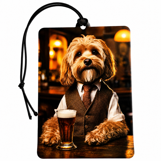 Rectangular car air freshener or luggage tag with a black hanging cord, featuring a printed illustration of a small fluffy dog dressed in a brown vest and tie at a bar with a glass of beer, shown on a white background.