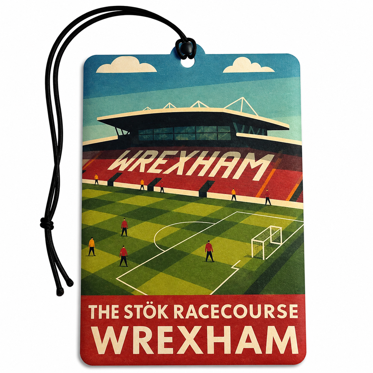 A rectangular luggage tag or tag-shaped car air freshener with a black hanging cord, printed with a vintage-style illustration of Wrexham Stadium. The design shows a green soccer field, red stands, blue sky, clouds, and large 'WREXHAM' lettering.