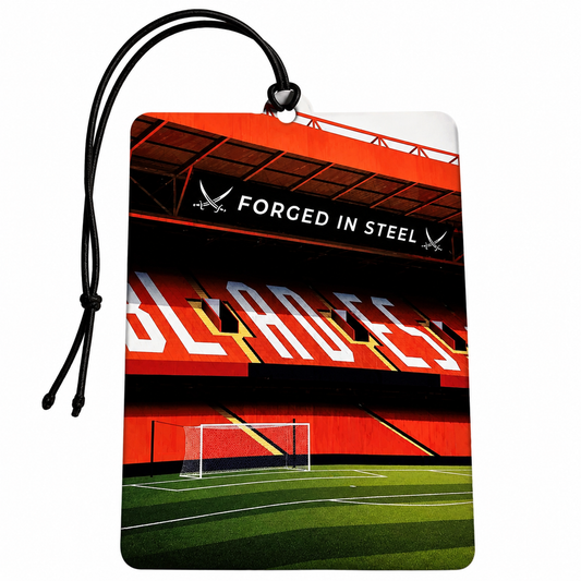 A rectangular car air freshener or luggage tag featuring a printed graphic of a football stadium with the text 'FORGED IN STEEL' and 'BLADES'. The tag has a black hanging cord and is shown against a plain white background.