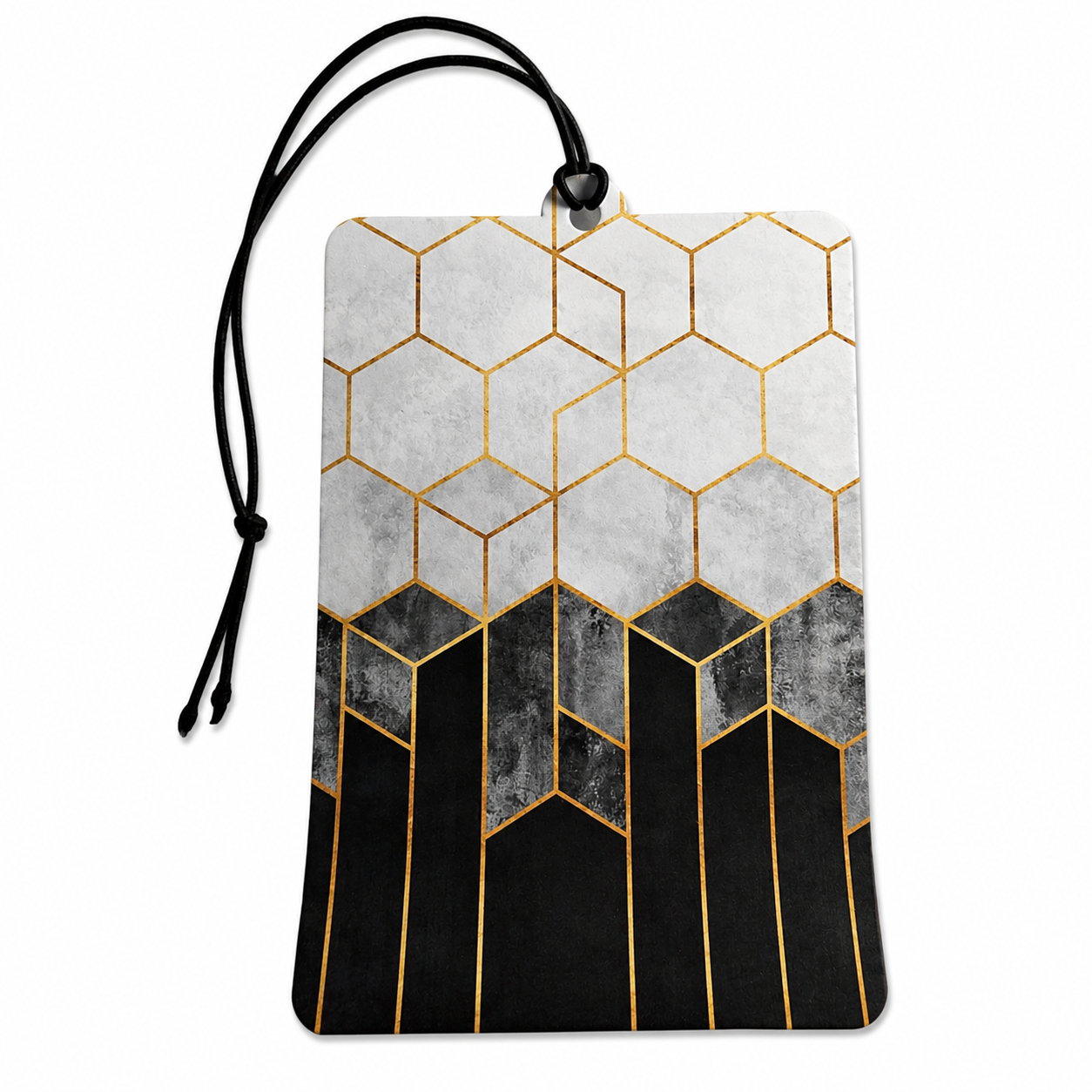 A rectangular luggage tag or car air freshener with a black hanging cord, featuring a geometric pattern of gold hexagons on a light gray top half and a black geometric pattern on a dark gray bottom half.
